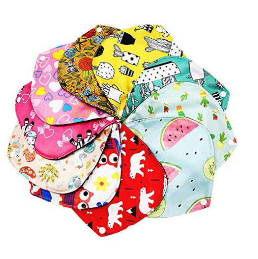 Stack of colorful clothe sanitary pads with various patterns on a white background