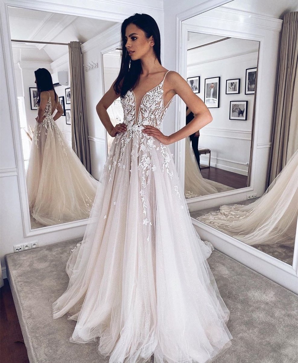 The White Ivy A-line Tulle Dress with Plunging V-Neckline and Floral lace Appliqués - Trusted Best Sellers™. All Rights Reserved. Trusted Best Sellers LLC.