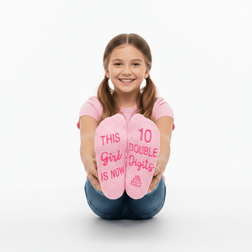 The soles of the socks are printed with the text 'THIS Girl IS NOW 10 DOUBLE Digits' and a small birthday cake graphic.