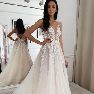 The White Ivy A-line Tulle Dress with Plunging V-Neckline and Floral lace Appliqués - Trusted Best Sellers™. All Rights Reserved. Trusted Best Sellers LLC.