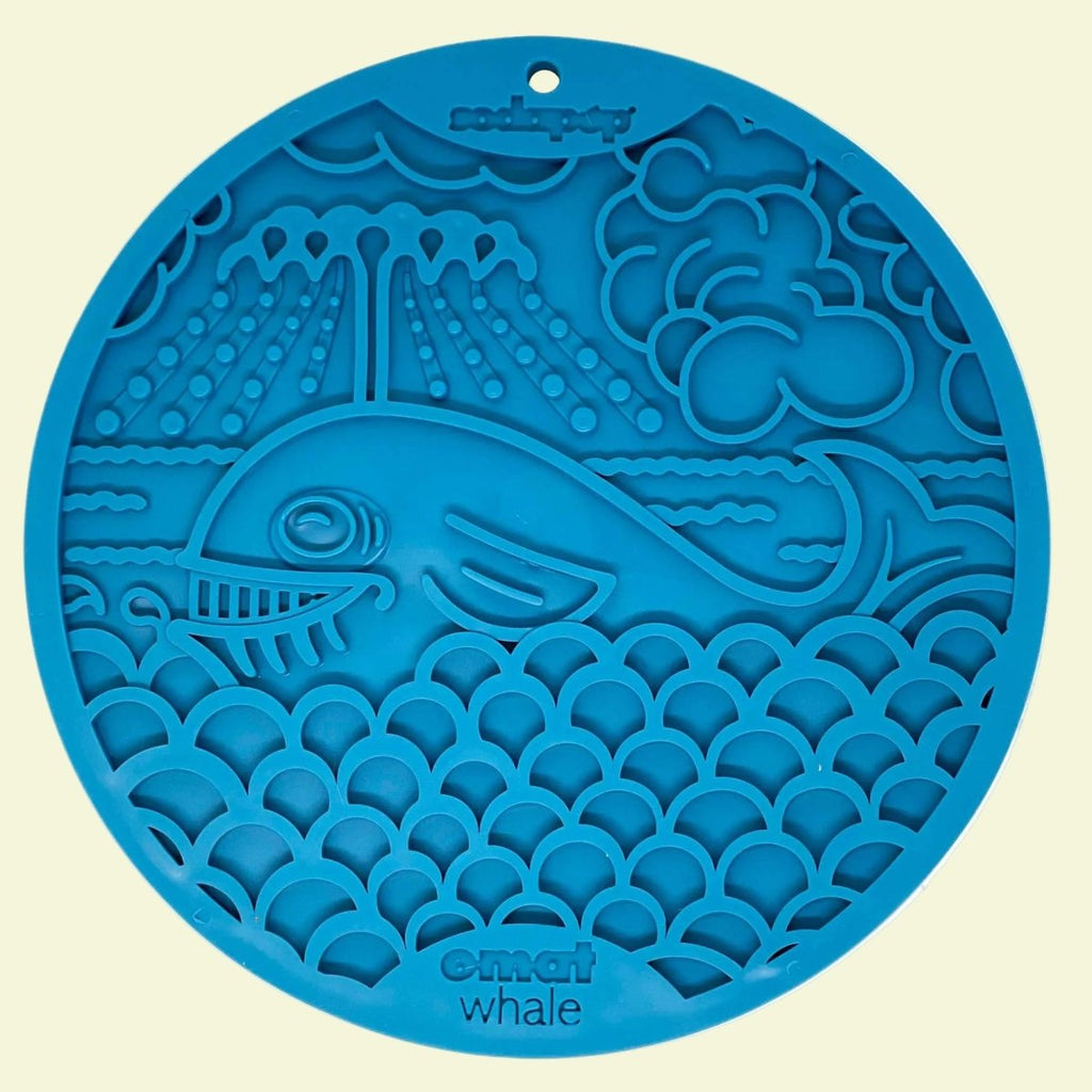 Blue whale-themed silicone placemat with ocean wave design, perfect for slow feeding and mental stimulation.