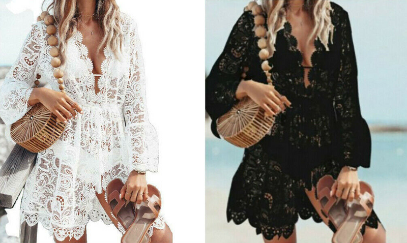 A side-by-side comparison of a women's lace cover-up dress shown in two color options: white on the left and black on the right. Both versions feature a deep V-neckline, long bell sleeves, and a scalloped lace hem.