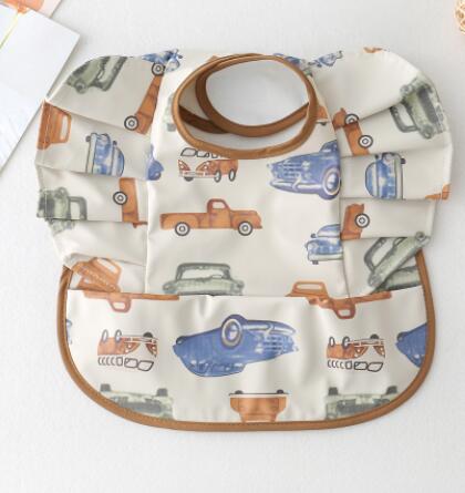TBS Baby Essentials™ Angel Wing Waterproof Feeding Bib with Catch Pocket - Trusted Best Sellers™. All Rights Reserved. Trusted Best Sellers LLC.
