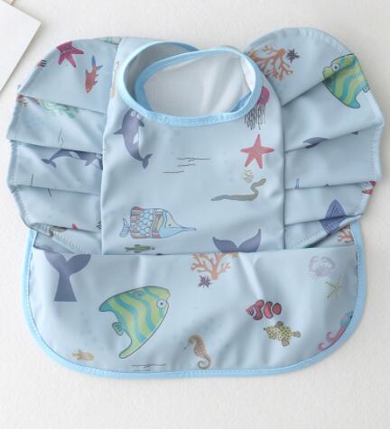 TBS Baby Essentials™ Angel Wing Waterproof Feeding Bib with Catch Pocket - Trusted Best Sellers™. All Rights Reserved. Trusted Best Sellers LLC.