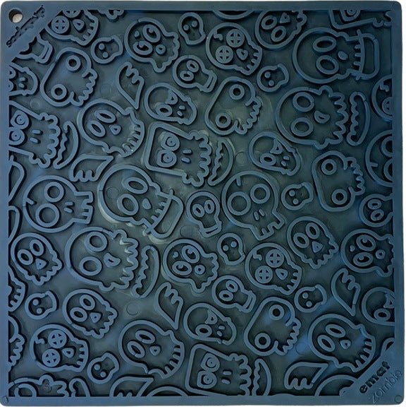 Blue silicone mat with embossed skull patterns, ideal for slow feeding and mental stimulation.