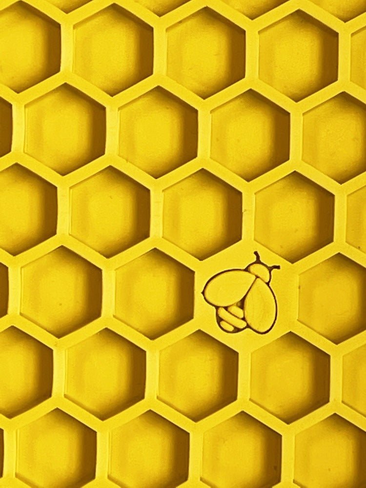 Yellow honeycomb pattern with small bee design, ideal for slow feeding and mental stimulation.