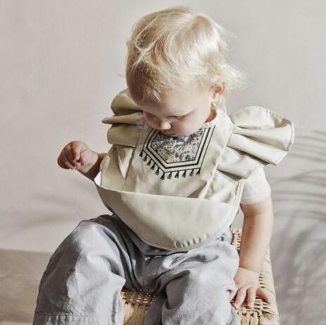 TBS Baby Essentials™ Angel Wing Waterproof Feeding Bib with Catch Pocket - Trusted Best Sellers™. All Rights Reserved. Trusted Best Sellers LLC.