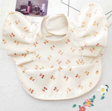TBS Baby Essentials™ Angel Wing Waterproof Feeding Bib with Catch Pocket - Trusted Best Sellers™. All Rights Reserved. Trusted Best Sellers LLC.