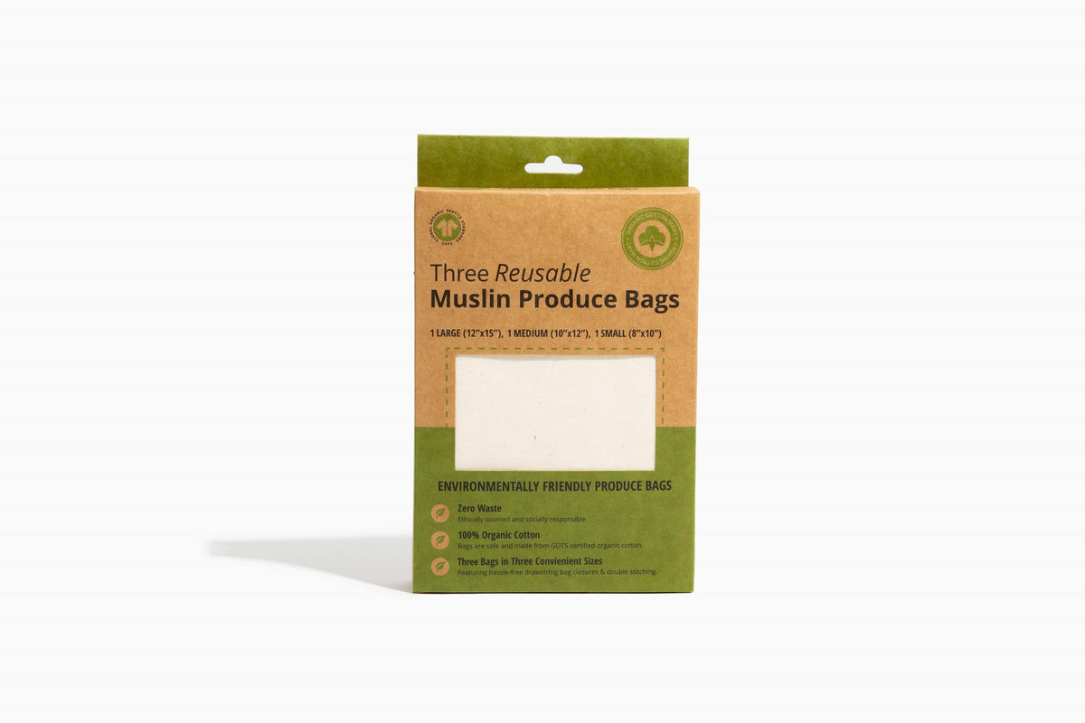Packaging of three reusable muslin produce bags on a white background